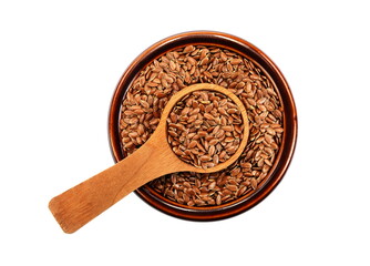 Linseed or flax seed in a bowl and a spoon in it seen from above isolated on white background