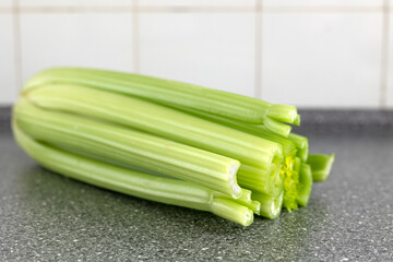 celery stalks on the kitchen board