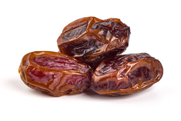 Raw Organic Medjool Dates, isolated on white background.