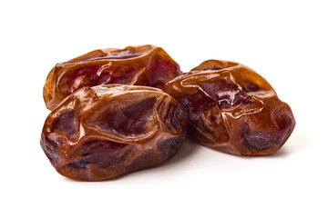 Raw Organic Medjool Dates, isolated on white background.