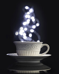 cup of coffee with bokeh steam