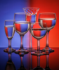 wine glasses with red white and blue refracted image