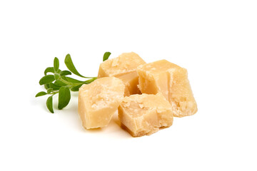 Parmesan cheese pieces, hard cheese, isolated on white background.