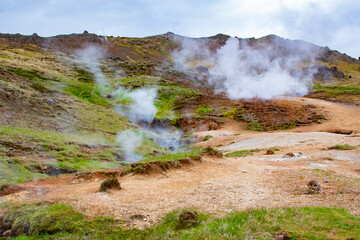 Steaming Vents and Volcanic Activity in the Mountains Near Reykjadalur Hot Spring Thermal River, Iceland