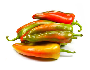 Different colored paprikas isolated on white background.