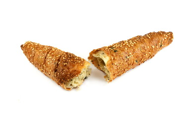 Salty croissant pastry with olives isolated on white background