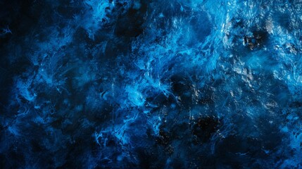 Fototapeta na wymiar Bold electric blue and jet black textured background, symbolizing power and mystery.
