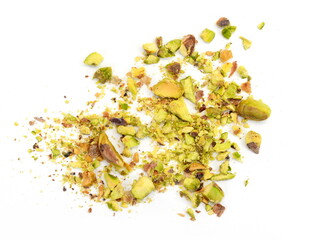 Ground, milled, crushed or granulated pistachio pile isolated on white background