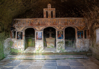 Naklejka premium The altar of the Corbii de Piatra monastery in Romania. It is an old place of worship dug into the rock, in a cave