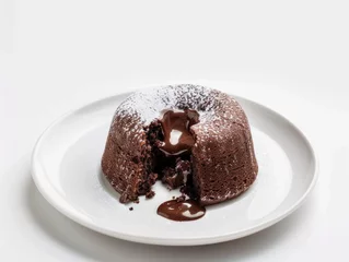 Fototapeten A chocolate dessert with a hole in the middle of it © Konstiantyn Zapylaie