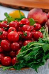 Pile of vibrant wet red Cherry tomato with green stems. Close up macro shot 