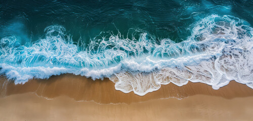 overhead view of ocean waves meeting a golden sandy shore - obrazy, fototapety, plakaty