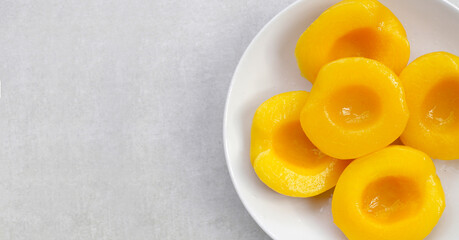 Peach halves in syrup. Fruity desserts