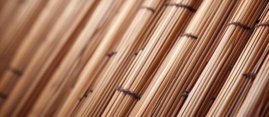 A detailed close-up view of a bamboo curtain, showcasing the intricate pattern and texture of the...