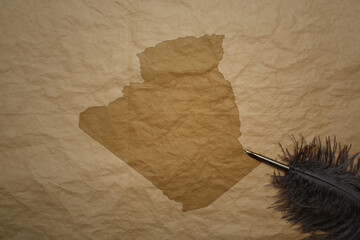 map of algeria on a old paper background with old pen