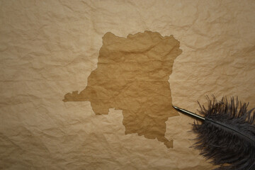 map of democratic republic of the congo on a old paper background with old pen