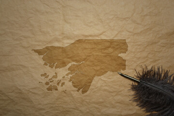 map of guinea bissau on a old paper background with old pen
