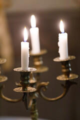 Elegant Candelabra with Lit Candles Illuminating a Dim Room