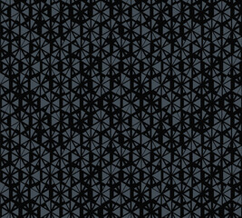 Dark monochrome vector seamless pattern with small randomly scattered triangles, floral shapes, hexagonal grid. Black and grey modern texture. Stylish background with halftone effect. Repeated design