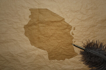 map of tanzania on a old paper background with old pen