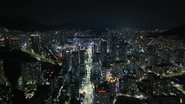 Aerial video  at night  over a residential area in Busan,  South Korea