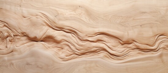 A detailed close up of a swirl pattern in brown hardwood flooring, resembling a landscape with shades of beige and peach. The intricate design showcases the natural beauty of wood