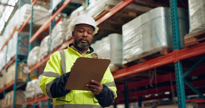 Manufacturing, warehouse and black man with clipboard for inspection, inventory and check stock. Shipping, distribution and person writing notes for logistics, maintenance and checklist in factory