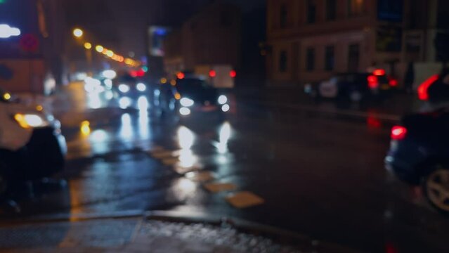 City in motion: Defocused view highlighting the dynamic and vibrant night life