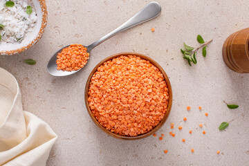 Red lentils raw in a bowl ready to be cooked - 755237386