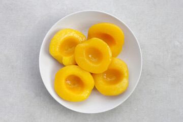Peach halves in syrup. Fruity desserts