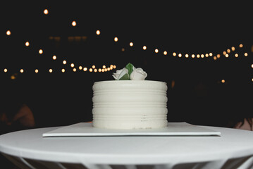 A wedding cake is the traditional cake served at wedding receptions following dinner