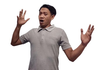 Young Asian man isolated on white background face covered by fingers frightened and nervous.