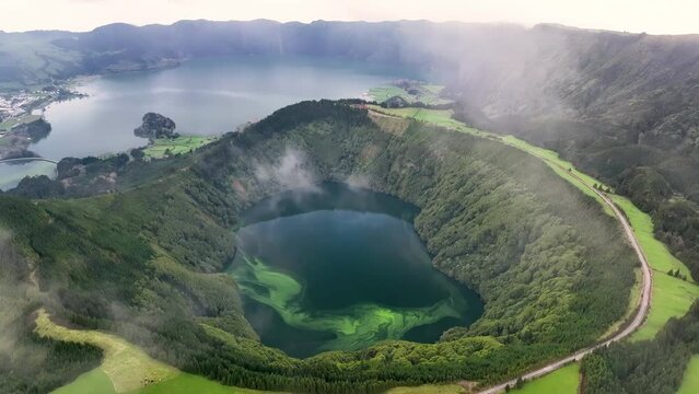 Aerial view lakes on green peaks, tropical island nature. Lagoa das Sete Cidades in the volcano crater. Sao Miguel Island, Azores, Portugal