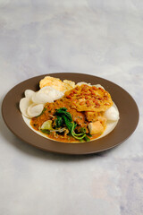 pecel, boiled vegetables with peanut sauce
