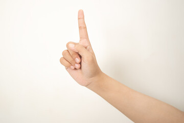 Hand pointing at something on white background