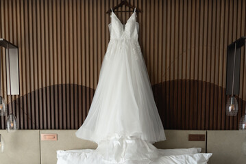 Fototapeta na wymiar A wedding dress or bridal gown is the dress worn by the bride during a wedding ceremony.