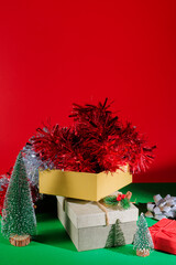 New Year, Christmas background with decorative New Year tree, gift inbox. Christmas still life composition with copy space