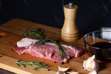 Fresh raw beef cut a wooden chopping board to prepare food