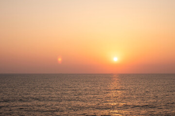 Obraz premium 海に沈む夕日