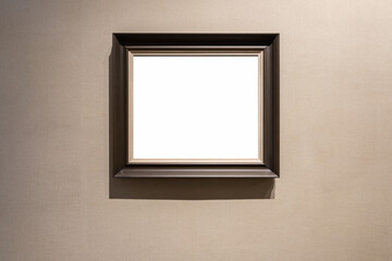 single blank picture frame on a wall