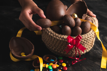 basket of chocolate Easter eggs, large and small with sprinkles