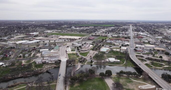 Aerial drone shot of San Angelo, Texas Historic Downtown and the Concho River