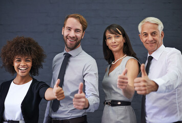 Business people, yes and thumbs up in studio portrait for success, diversity and achievement with...