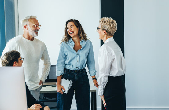 Collaboration in a finance company: Business professionals having a team meeting