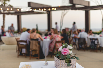 A centerpiece is a central decorative object, often flowers, candles or fruit, and is an important part of the wedding reception decoration.