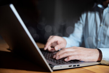Fototapeta na wymiar man using laptop computer on white background