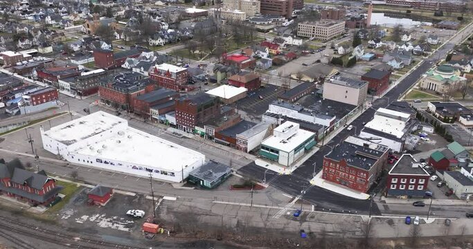 Sayre, PA, USA - 03-03-2024 - Cloudy winter aerial video of the downtown area in the City of Sayre, PA. 