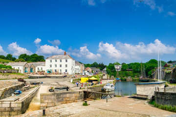 Charlestown, Cornwall, UK - An unspoiled example of a Georgian working port, it was built between 1791 and 1801, and has been used as a location in films and TV. - obrazy, fototapety, plakaty