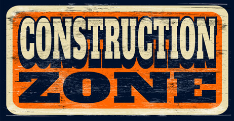 Aged and worn construction zone sign on wood