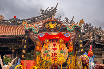 Colorful decorations outside the landmark Longshan Buddhist Temple in Taipei